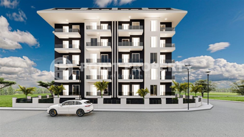 Апартаменты на 1-м и 2-м этажах в жилом комплексе на этапе строительства, в центре района Махмутлар-id-5755-фото-1