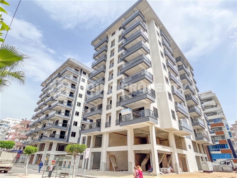 Новая квартира с чистовой отделкой в 150 метрах от моря, в центре современного района Аланьи - Махмутлар-id-5767-фото-1