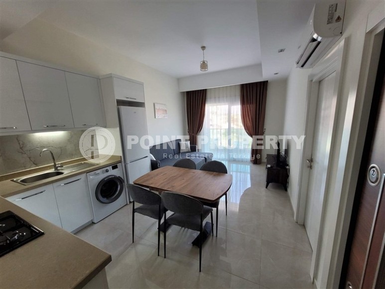 A small, bright apartment with one bedroom in a quiet, well-maintained area of Alanya - Avsallar-id-5782-photo-1