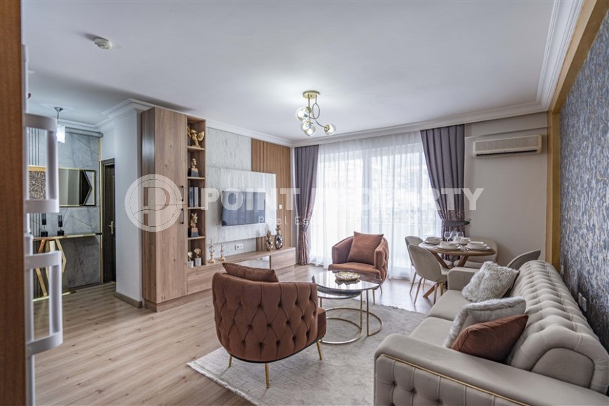 Stylish apartment with designer renovation, 250 meters from the sea, in the very center of Alanya-id-5788-photo-1