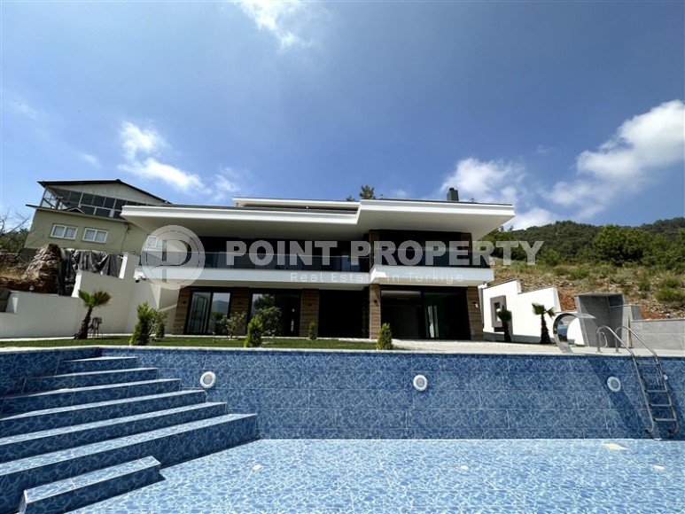 Luxurious three-storey villa with a swimming pool and garden, in a prestigious area of Alanya - Tepe-id-5851-photo-1