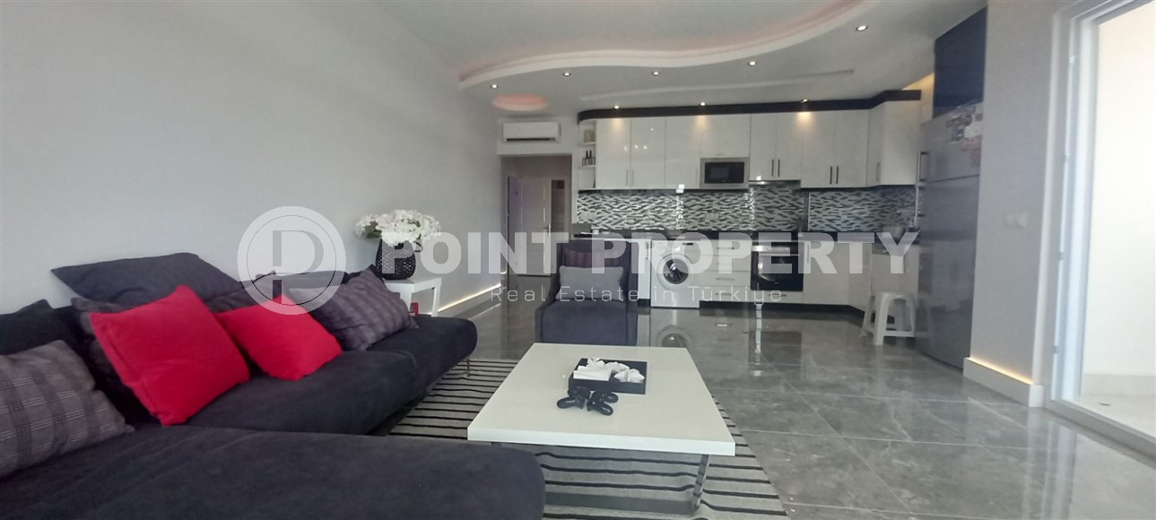 Apartment with two bedrooms in the center of a modern, developed area of Alanya - Mahmutlar-id-5866-photo-1
