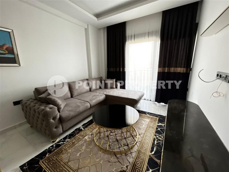 New furnished 1+1 apartment, with a total area of 52 m2, in a picturesque, quiet area of Alanya - Upper Oba-id-5870-photo-1