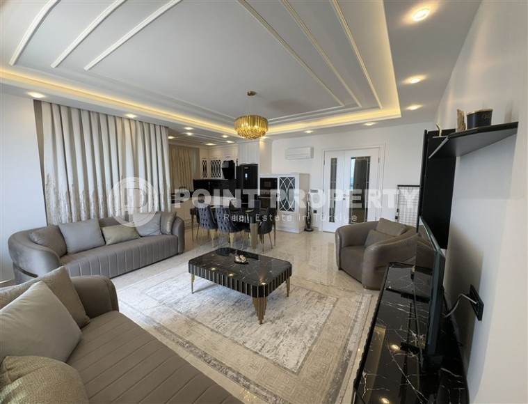Apartment with designer renovation on the first line from the sea, in the Mahmutlar area-id-5893-photo-1
