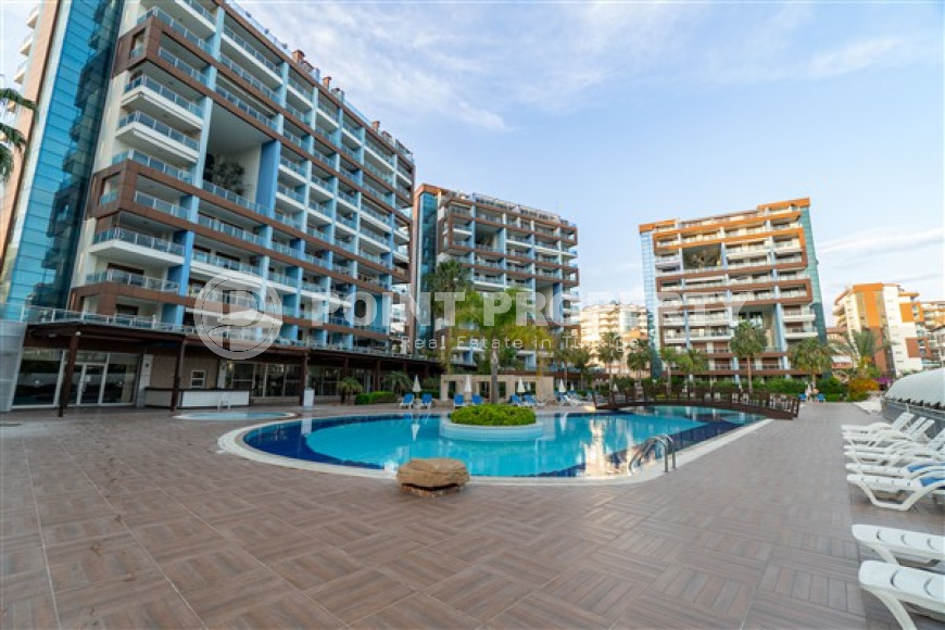 Furnished three-bedroom apartment, 140m², in a luxury complex in Alanya - Cikcilli-id-1463-photo-1